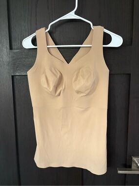 Evelyn and Bobbie defy bra tank in sand